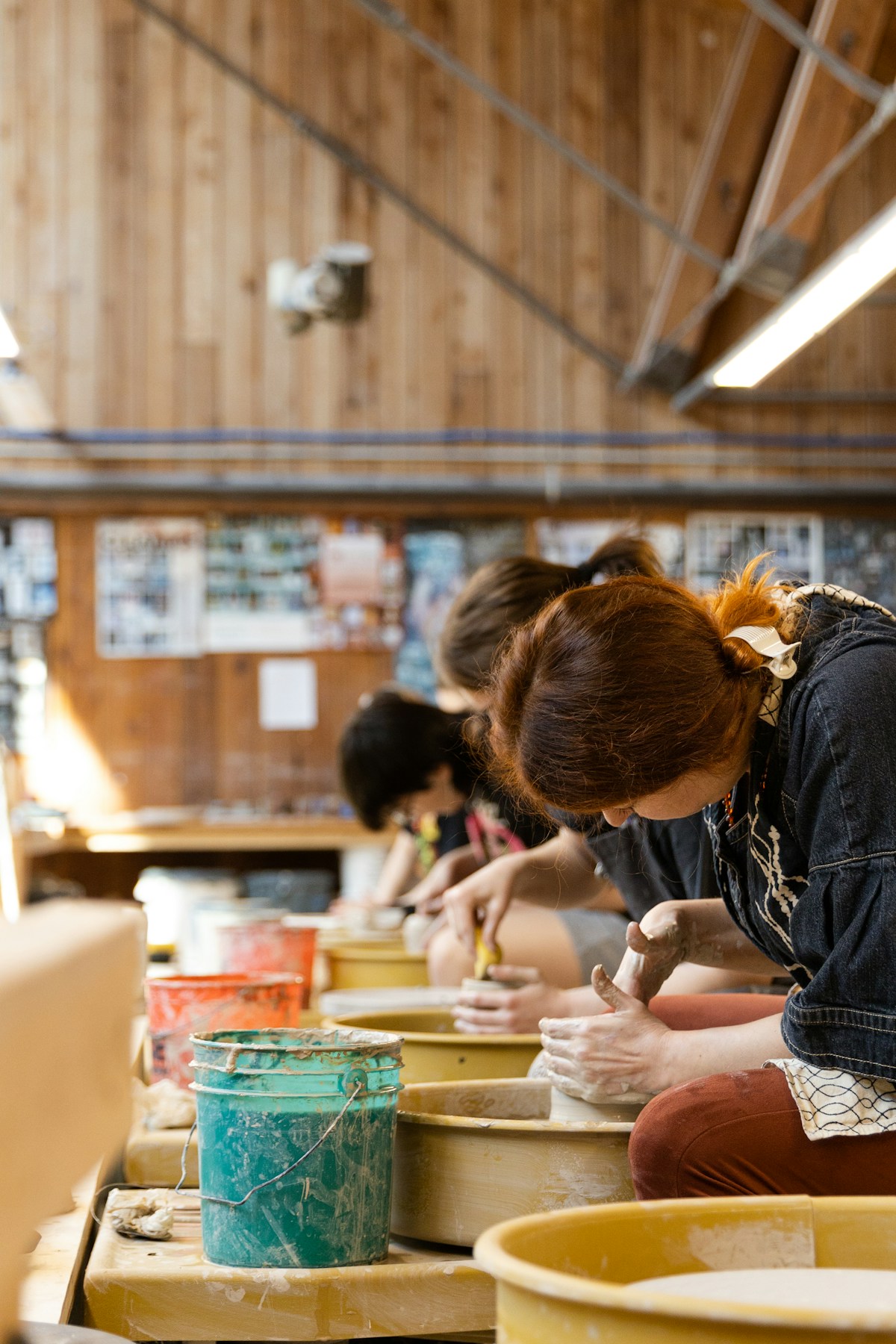 People enjoying a hands-on pottery class